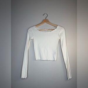 Topshop lettuce-hem long-sleeve top in cream